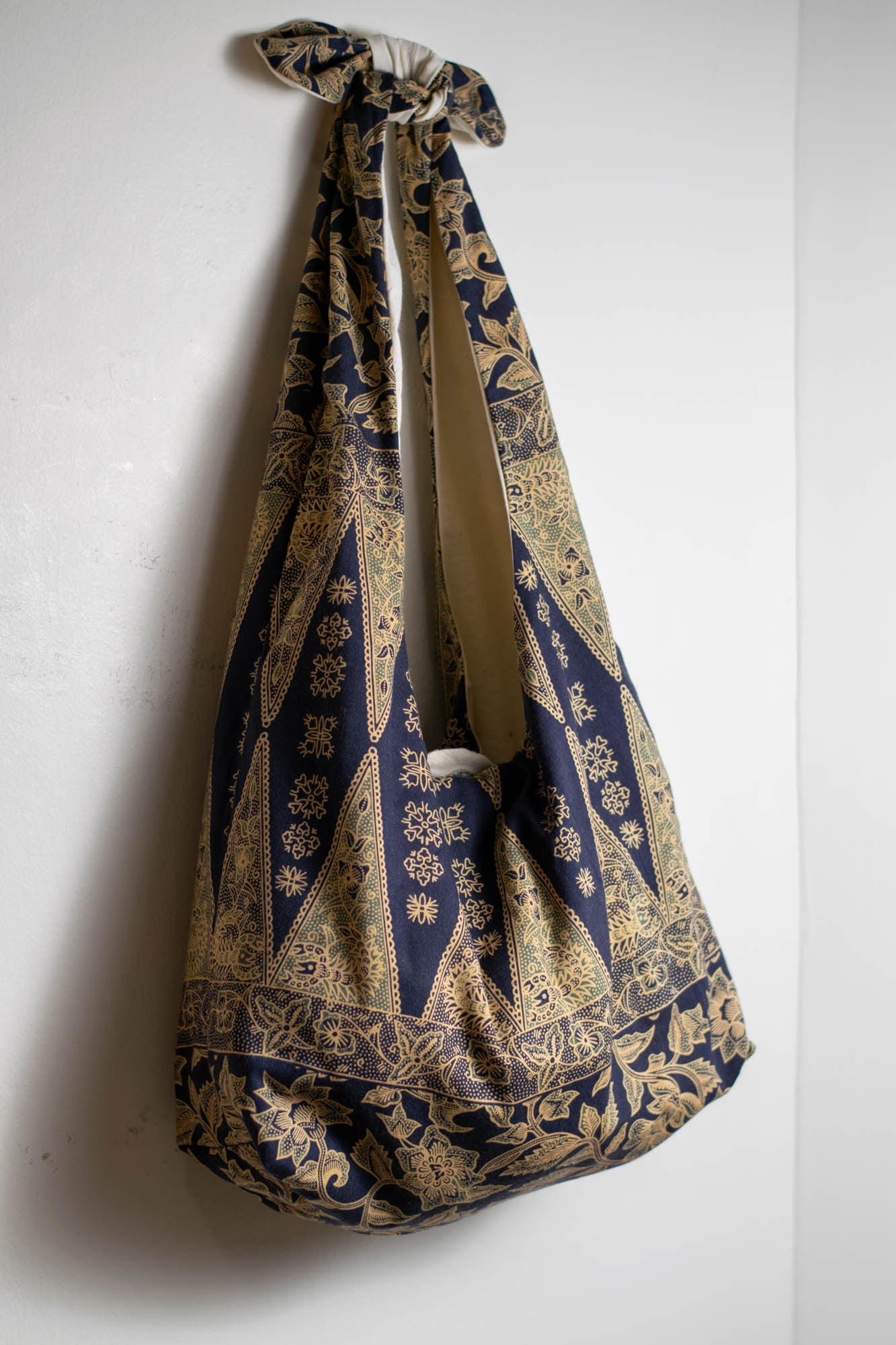 Reversible Shoulder Tie Sac Made from Salvaged Fabric — Dark Blue and Beige Botanical