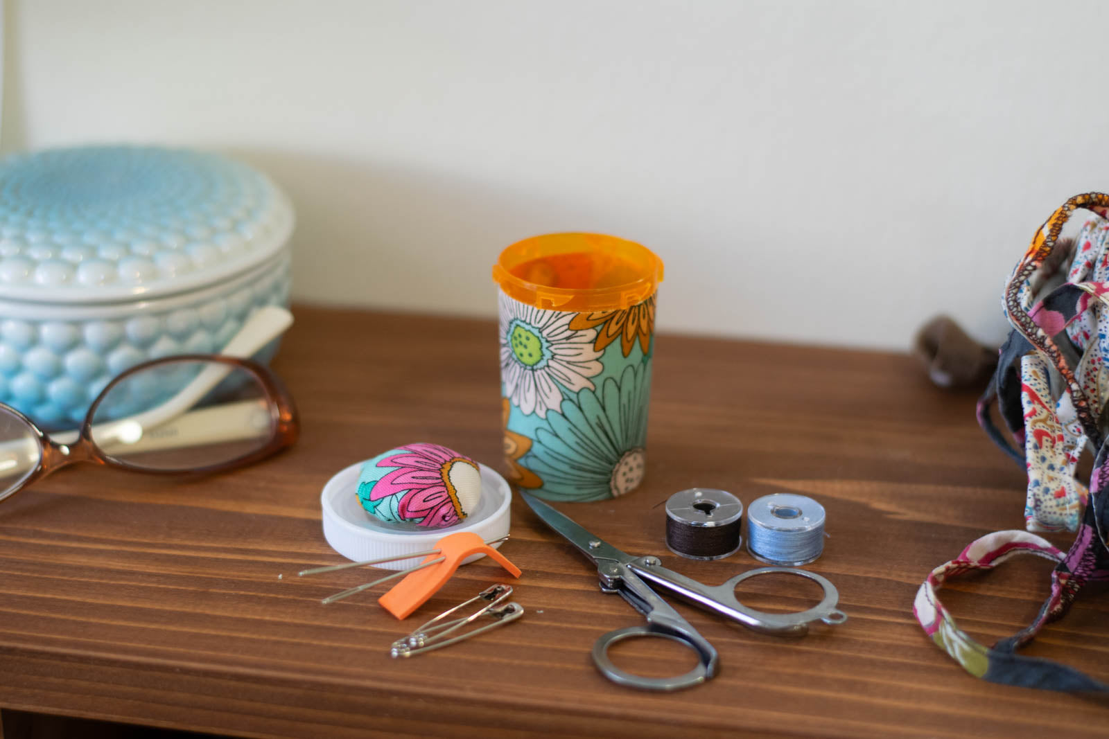 Upcycled Prescription Bottle Sewing Kit — Pink, Ochre and White Flowers on Light Blue, 2.75" high, open with contents