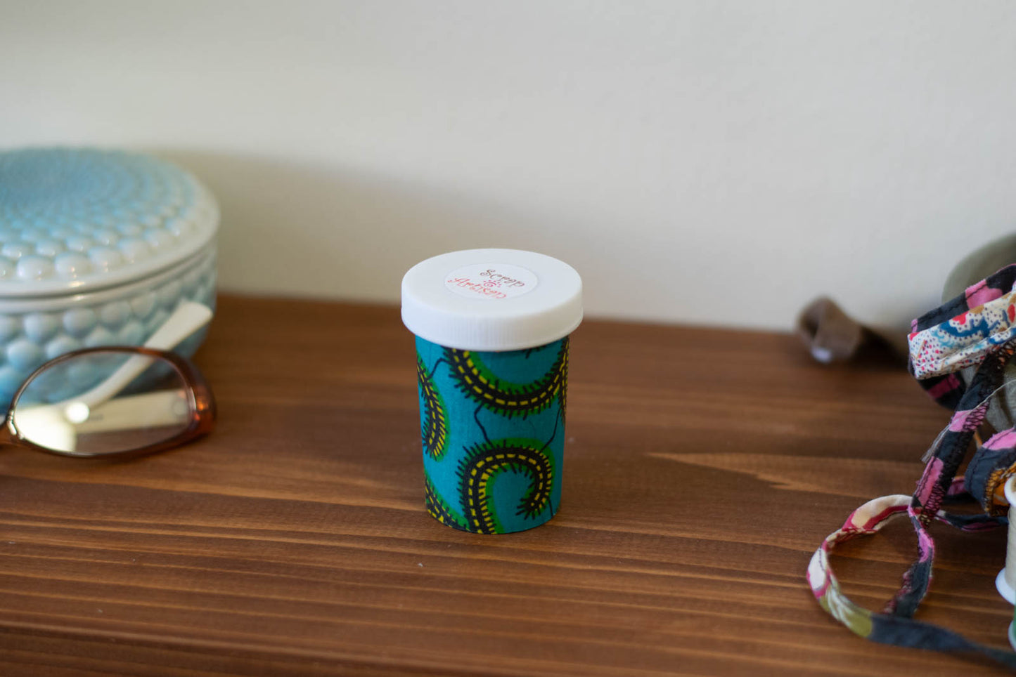 Upcycled Prescription Bottle Sewing Kit — Teal African Wax Print, 2.75" high, closed