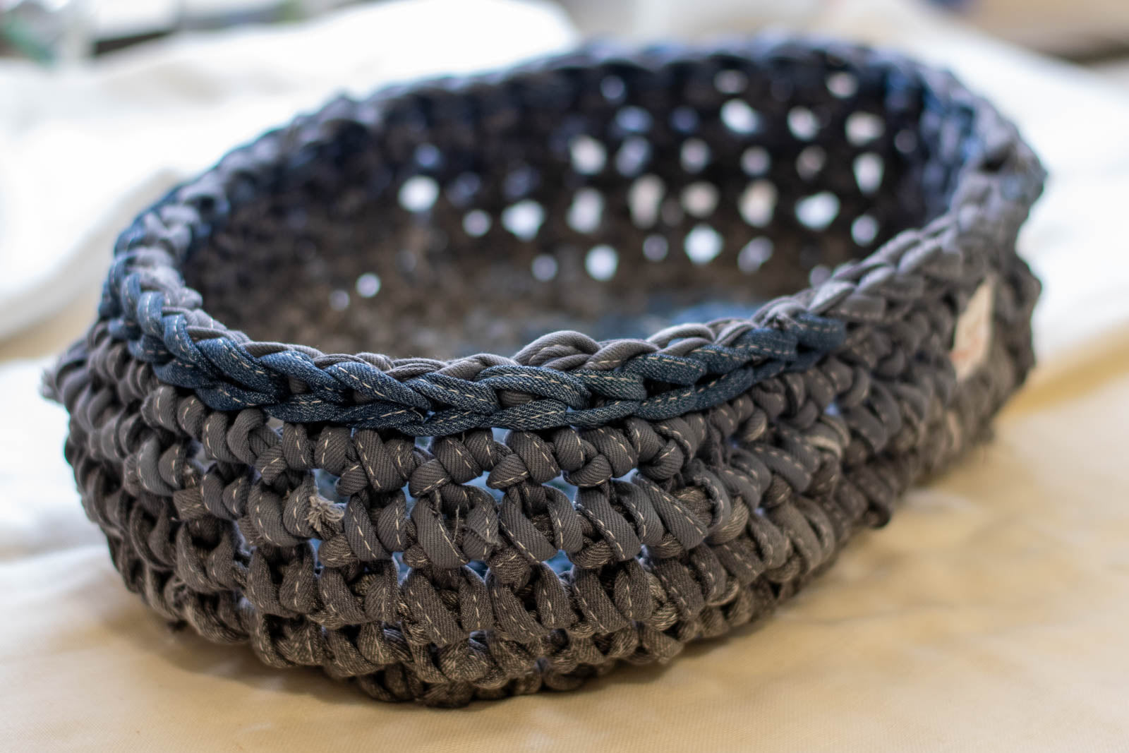 Eco Friendly Jean Basket — Large Oval, narrow side view with label