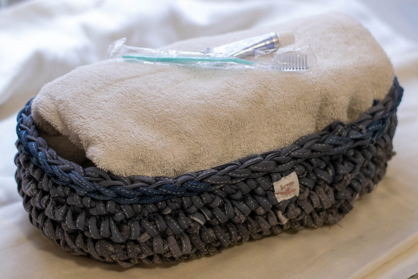 Eco Friendly Jean Basket — Large Oval, side view with towel