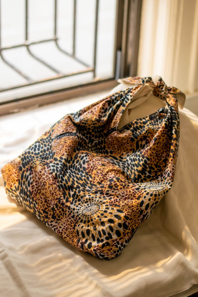 Reversible Azuma Sack Medium Made from Salvaged African Fabric B, outside, tied-2