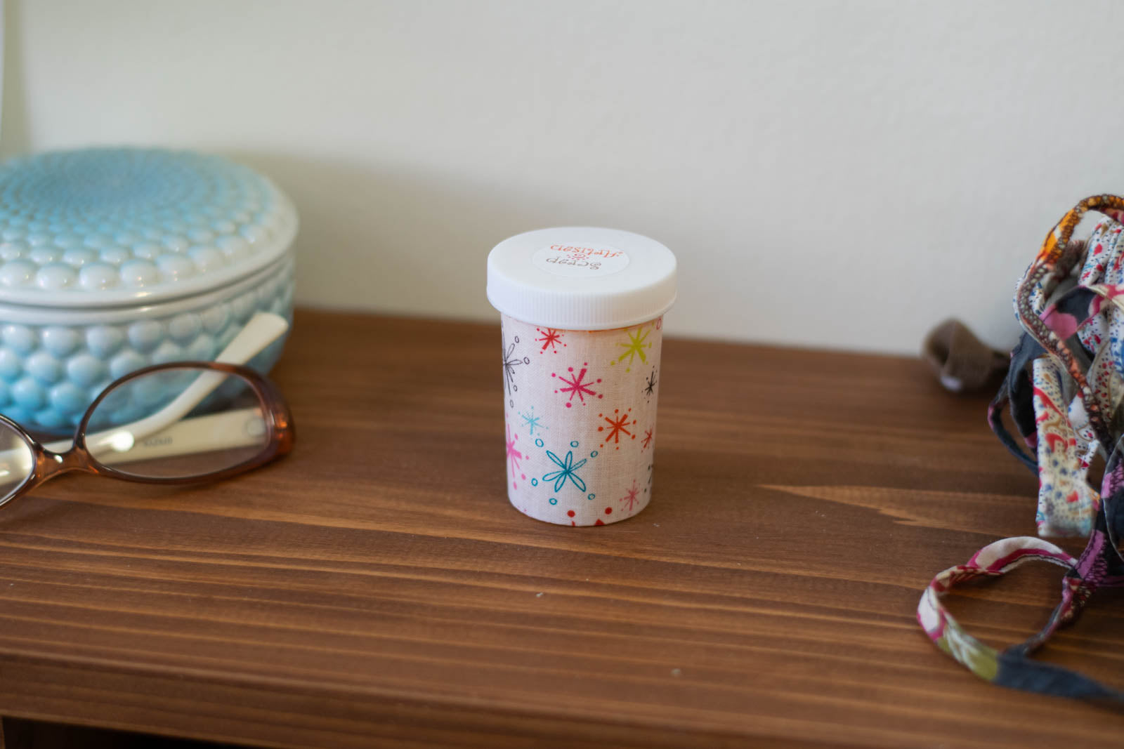 upcycled prescription bottle sewing kit — multi color sparkles on white, 2.75" high, closed