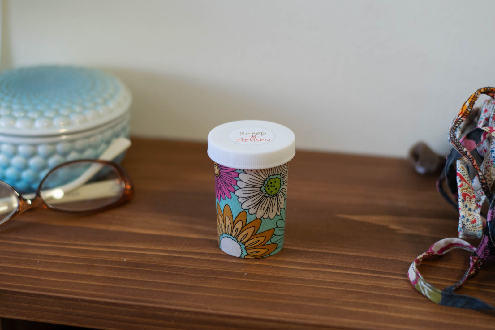 Upcycled Prescription Bottle Sewing Kit — Pink, Ochre and White Flowers on Light Blue, 2.75" high, closed