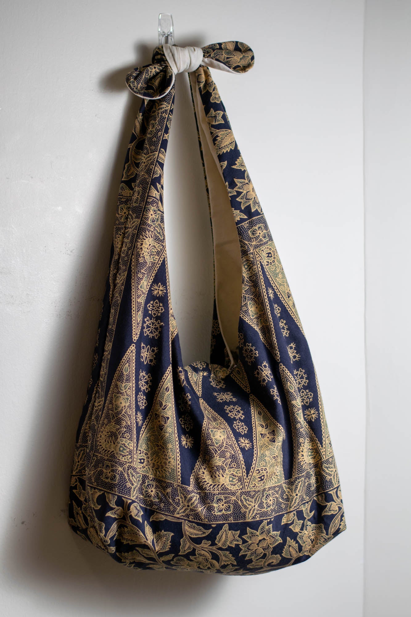 Reversible Shoulder Tie Sac Made from Salvaged Fabric — Dark Blue and Beige Botanical