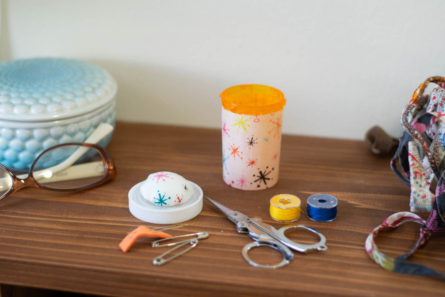 upcycled prescription bottle sewing kit — multi color sparkles on white, 2.75" high, open with contents