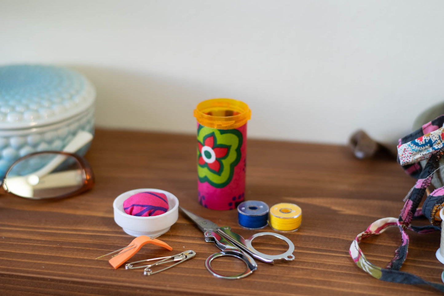 Upcycled Prescription Bottle Sewing Kit — Large Flower Print, 3" high, lid open with contents