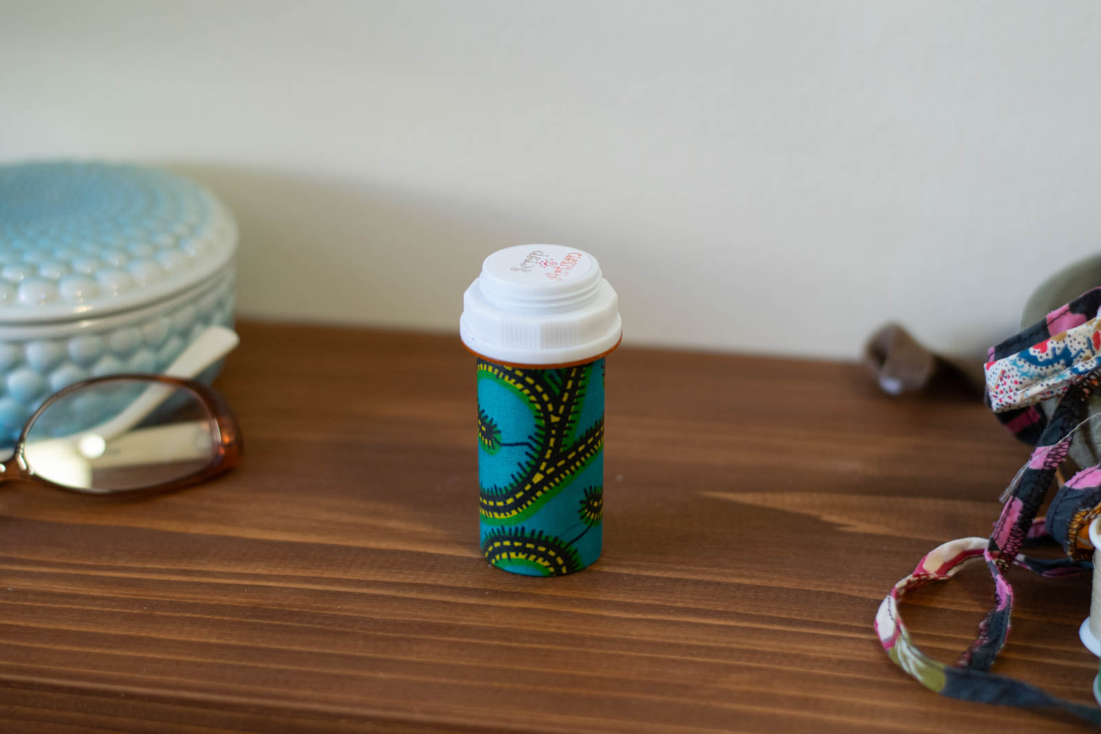 Upcycled Prescription Bottle Sewing Kit — Teal African Wax Print, 3.25" high, closed