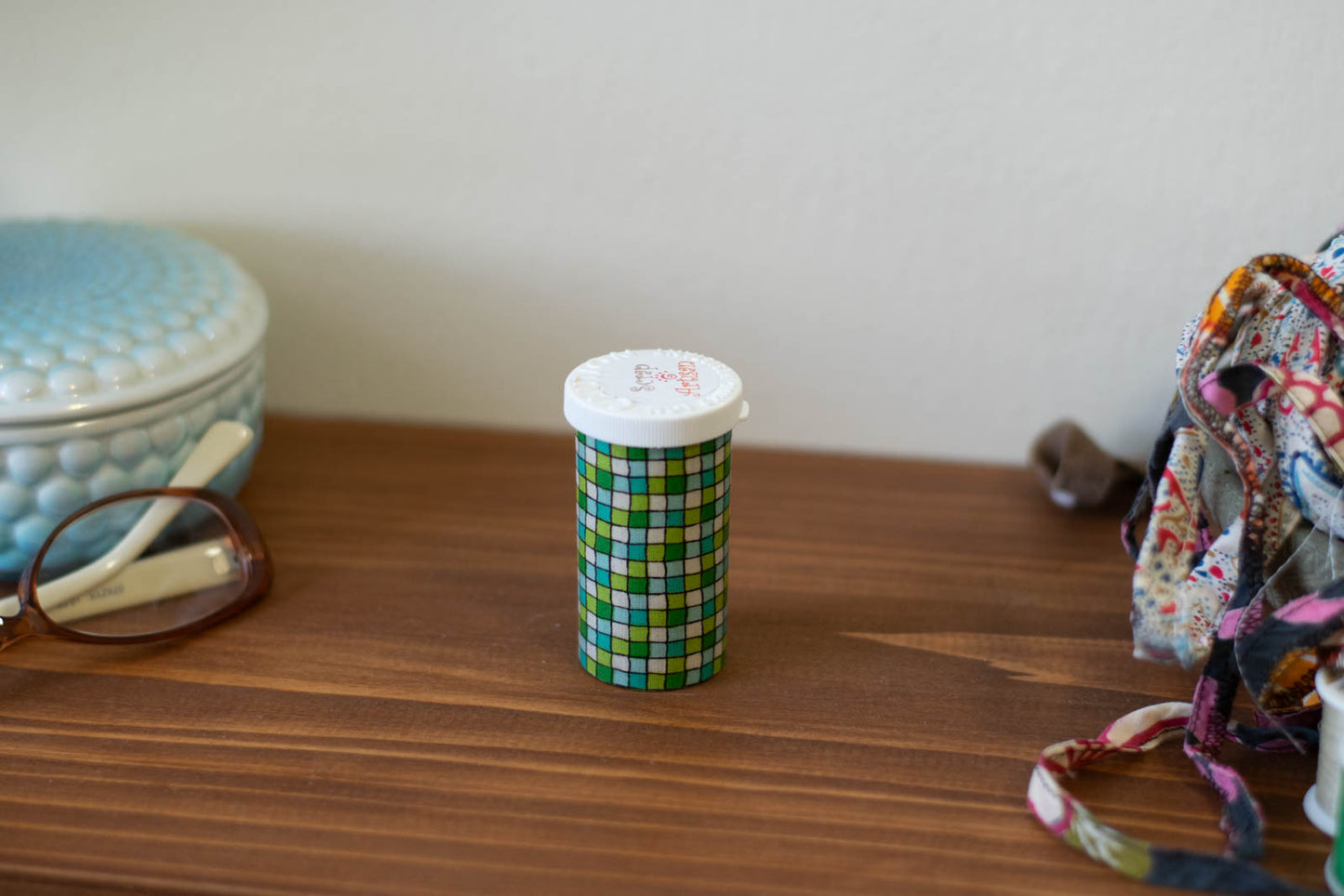 upcycled prescription bottle sewing kit — green tiles, 2.75" high, easy open lid, closed