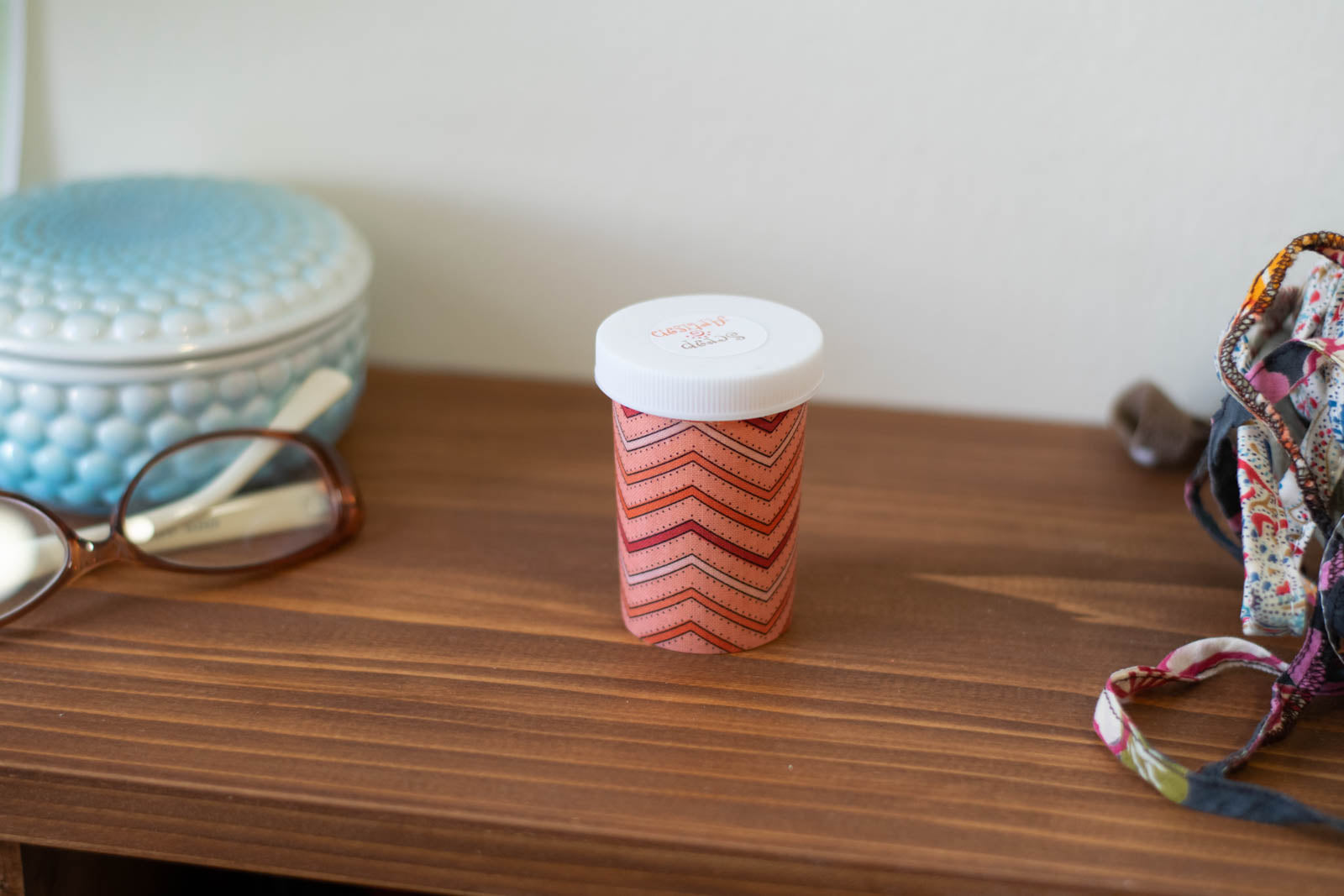 Upcycled Prescription Bottle Sewing Kit — Red and Orange Chevron with Dots on Pink, 2.75" high, closed