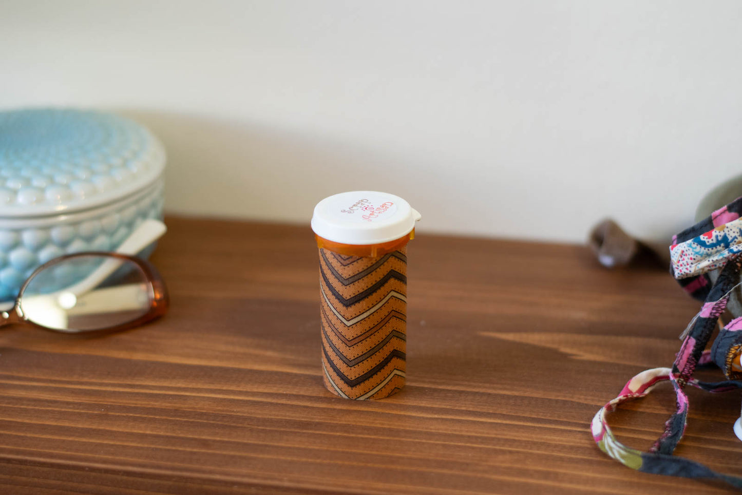 upcycled prescription bottle sewing kit — brown chevron pattern with dots, easy open lid closed , 2.75" high